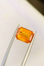 Vivid orange emerald cut sapphire fine gemstone