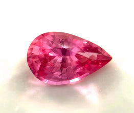 Natural 1.06 ct unheated Padparadscha sapphire pear cut with pinkish orange colour.