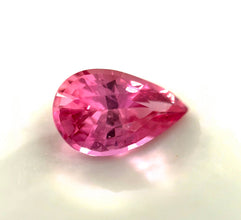 Rare unheated Padparadscha sapphire loose gemstone with exceptional luster.