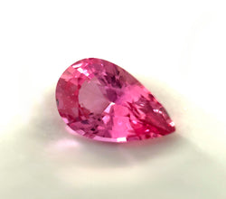 Pear-cut natural Padparadscha sapphire for engagement rings and bespoke jewellery.