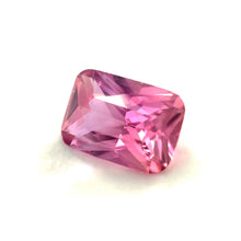 Loupe-clean Padparadscha sapphire loose gemstone with vibrant natural luster.