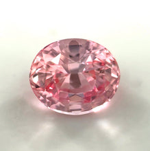Natural 1.14 ct unheated peach Padparadscha sapphire with elegant oval cut.