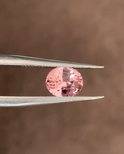 Commercial-quality unheated Padparadscha sapphire loose gemstone.