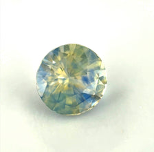 Natural bi-color sapphire for engagement rings with forest green and blue hues.