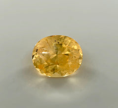 1.15 carat vivid yellow sapphire oval cut unheated natural gemstone
