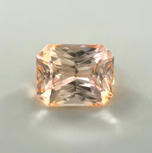 1.53 carat heated peachy Padparadscha sapphire radiant cut loupe clean gemstone
