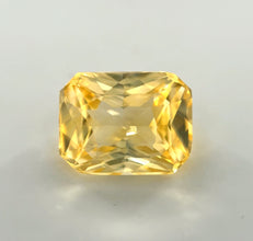 2.30 carat radiant cut yellow sapphire, unheated natural gemstone with good color