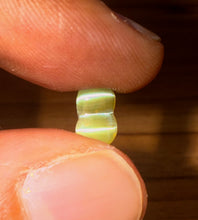 2.18ct double dome cat’s eye showing clear chatoyancy effect under direct light.