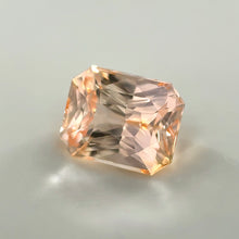 Peachy Padparadscha sapphire radiant cut heated gemstone for fine jewelry