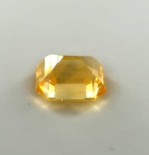 2.07 carat vivid yellow sapphire, emerald cut, untreated loupe clean gemstone with brilliant luster, natural Sri Lankan sapphire