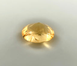 Eye clean unheated yellow sapphire 1.15 carats oval cut