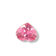 Close-up side angle of natural heart-cut Padparadscha sapphire showing pink-orange color blend and precision faceting