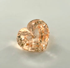 2.01 carat unheated peachy Padparadscha sapphire loupe clean brilliant luster