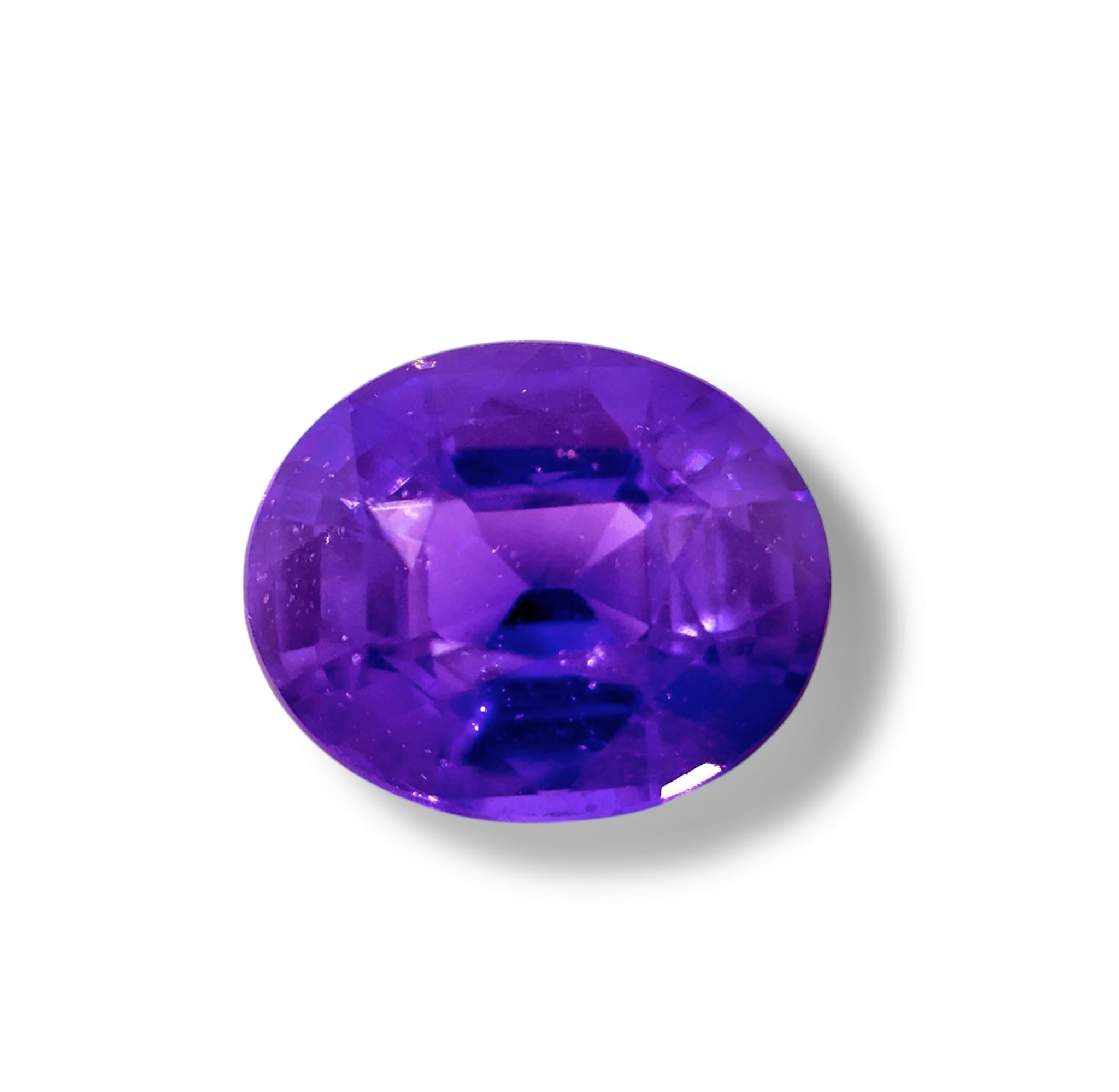 Oval cut unheated purple sapphire – untreated natural gemstone