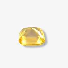 Premium natural yellow sapphire loose stone displaying bright luster and clean clarity