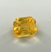 2.07 carat vivid yellow sapphire, emerald cut, untreated loupe clean gemstone with brilliant luster, natural Sri Lankan sapphire