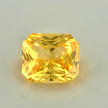 2.51 carat radiant cut yellow sapphire with vivid yellow color and brilliant luster, natural unheated gemstone