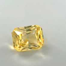 Unheated yellow sapphire loose stone with bright luster and sharp faceting
