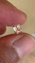 1.53 carat heated peachy Padparadscha sapphire radiant cut loupe clean gemstone
