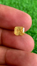 2.51 carat radiant cut yellow sapphire with vivid yellow color and brilliant luster, natural unheated gemstone